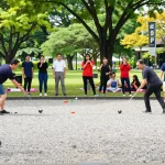 Community petanque game at FOPI Kota Tomohon, showcasing competitive spirit and team camaraderie.